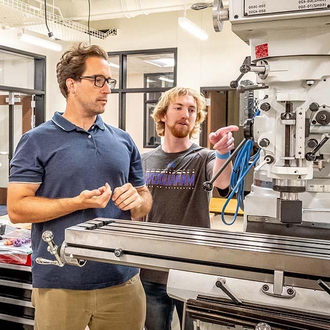 Engineering Student with Faculty in Engineering Lab.